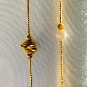 Pair of gold-toned necklaces